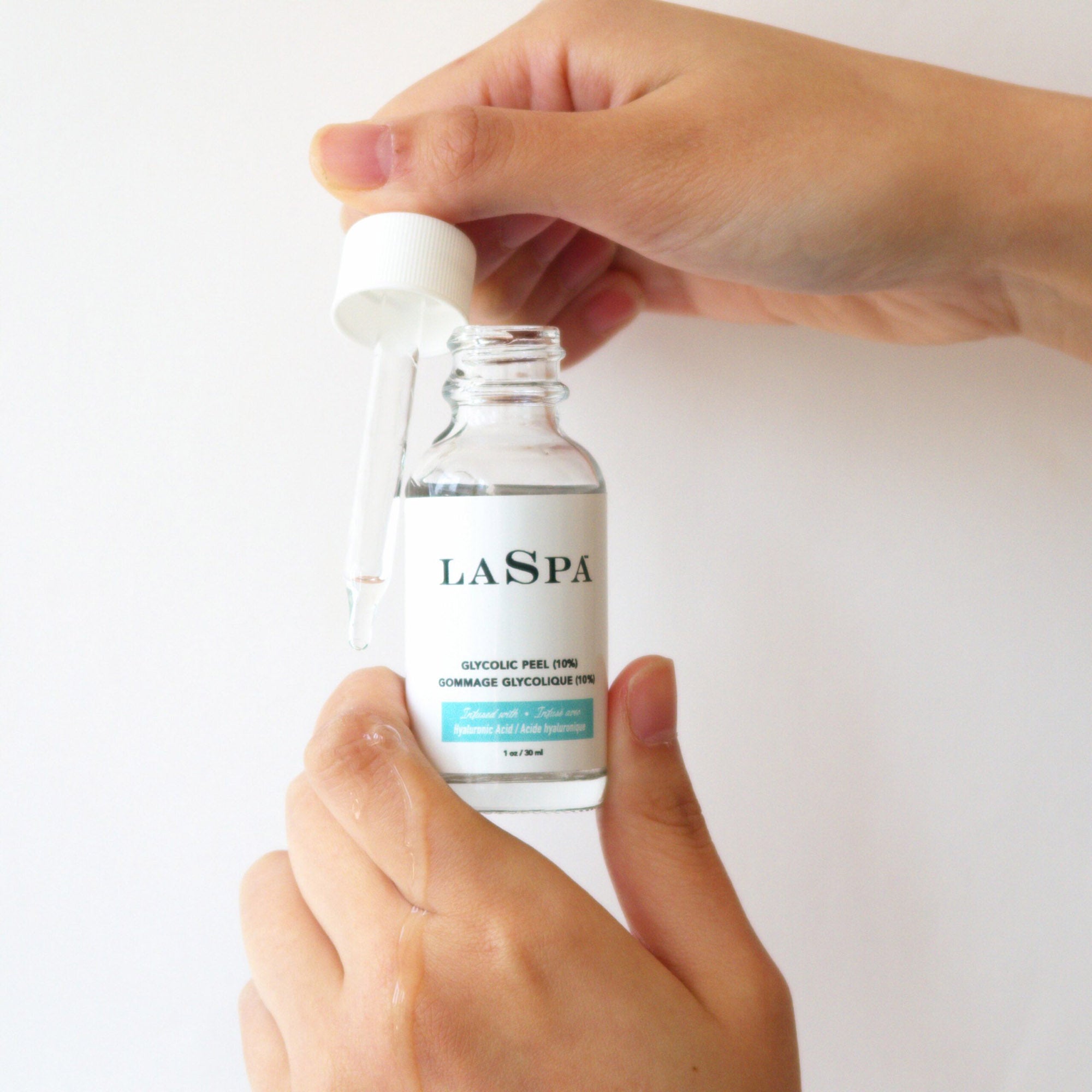 Womans hands holding LASPA Glycolic Peel (10%)